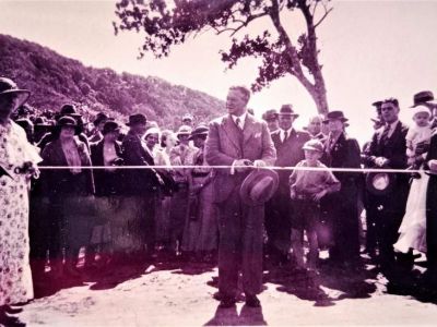 edith garner  left  and mrs alexander  right  holding ribbon at opening of the bridge at bingil bay  9 july  c  garner family